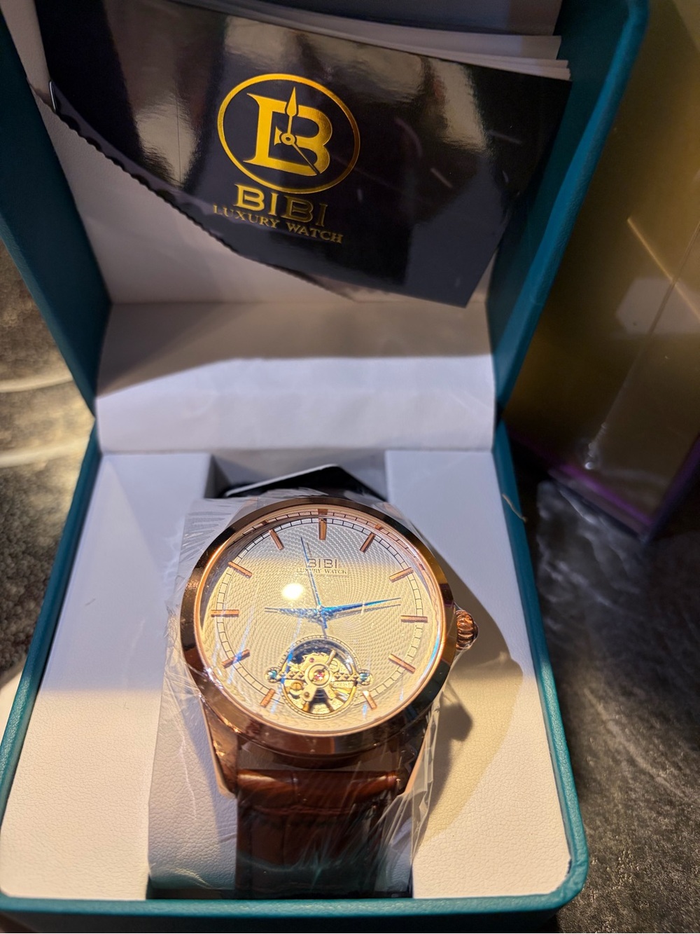 BiBi Rose Gold Watch with Blue Hands and Brown Strap